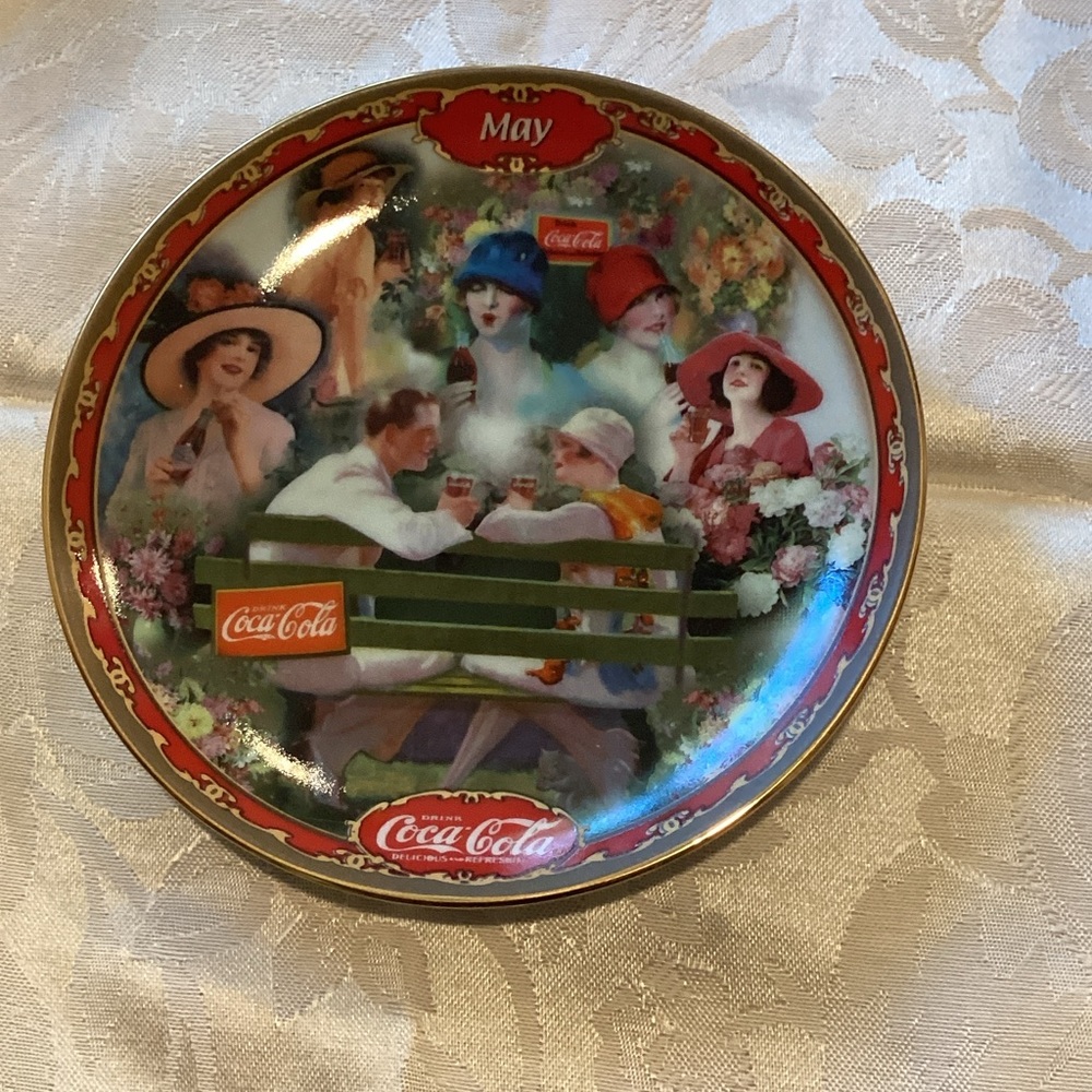 Coca-Cola Collector's Plate with Red and Gold Accents